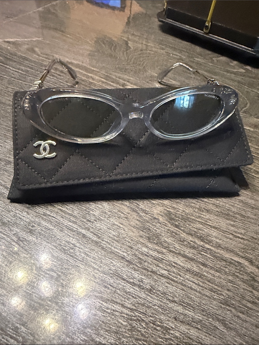 CHANEL Clear Frame Sunglasses with Black Quilted Logo Case